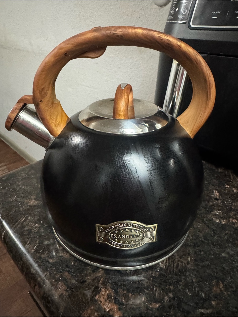 Black Teakwood-Handle Whistling Kettle